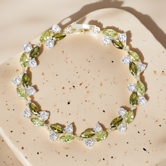 Emerald Whisper Leaf Bracelet – Green & White Zirconia Elegance in Gold Plated Copper